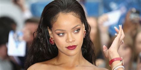 rihanna nude|Rihanna Wears Nothing But Body Chains in a Sensual Nude。